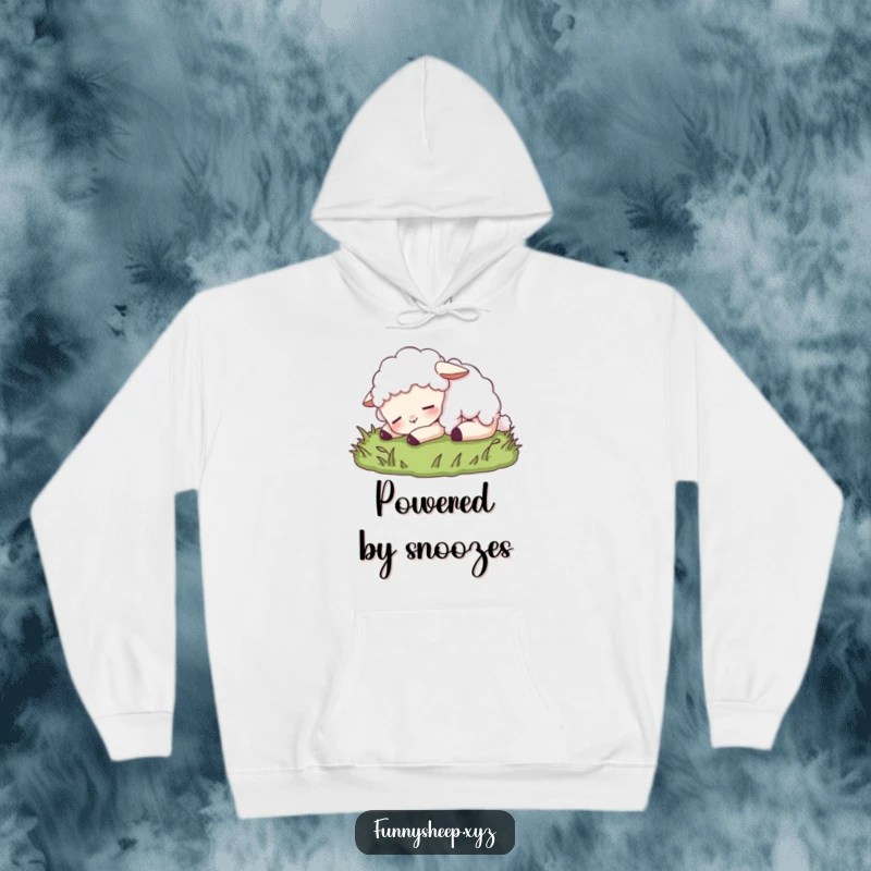 Funny sheep hoodie depicting a content sheep character peacefully napping on lush grass, offering warmth and humorous tranquility.